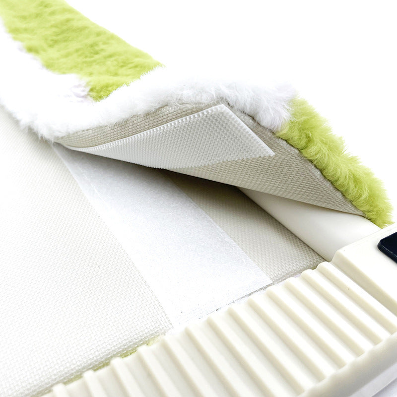 Close-up of a green and white textured mat with a white background