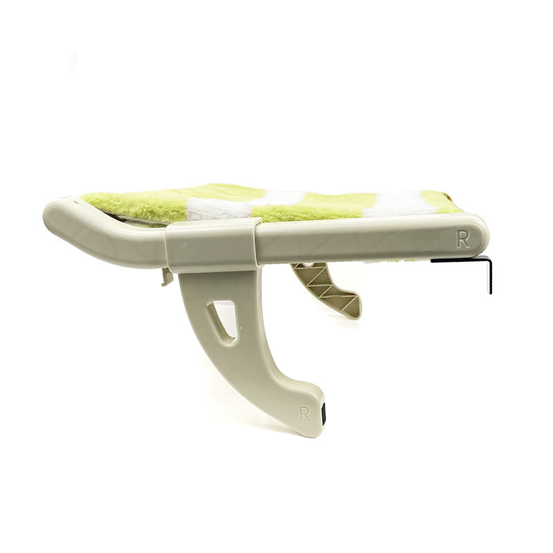 White and green ironing board with a striped pad on a white background