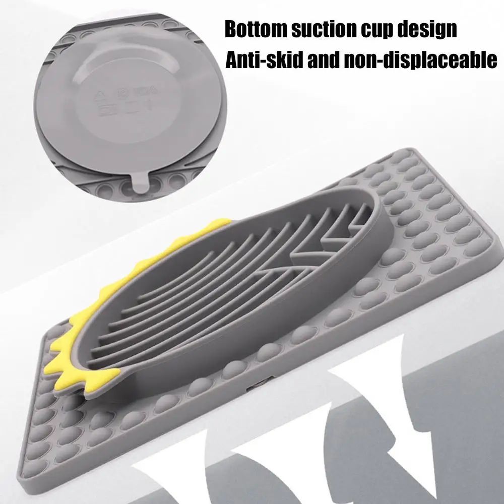 Gray anti-skid mat with suction cup design on a white background