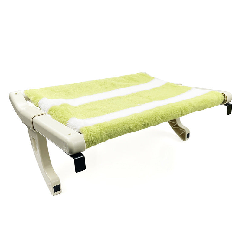 Green pet bed with white stripes on a white background